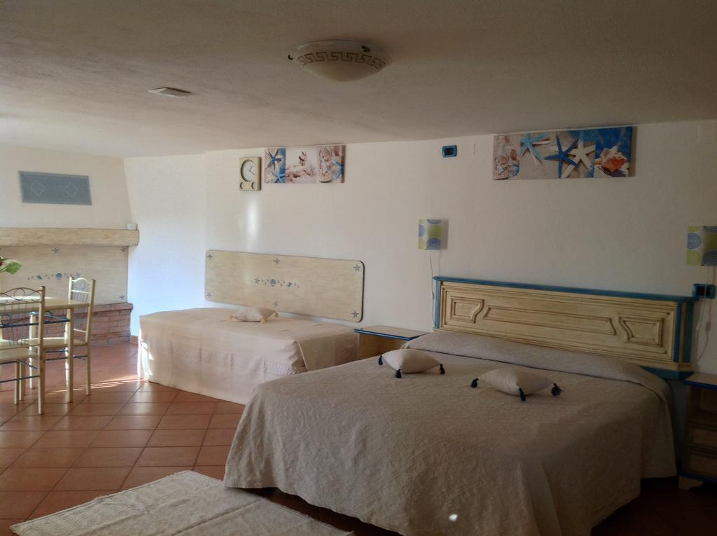 Addisora Appartamenti Cala Liberotto Pokój zdjęcie