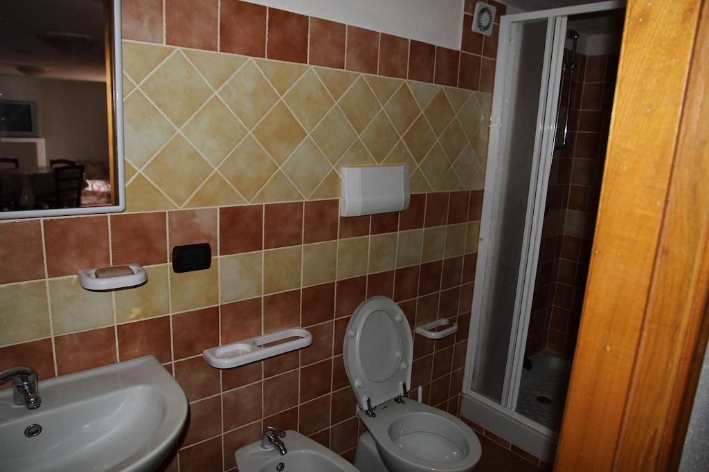 Addisora Appartamenti Cala Liberotto Pokój zdjęcie